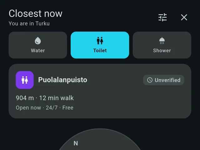 Compass mode pointing at the nearest toilet, 904 metres away and open 24/7.